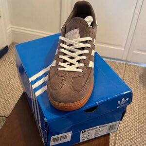 adidas Brown and White Athletic Shoes men 9
Women 11